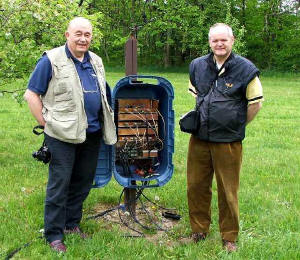 John, ON4UN, and Roger, On6WU, Inspecting the Control/Switching System